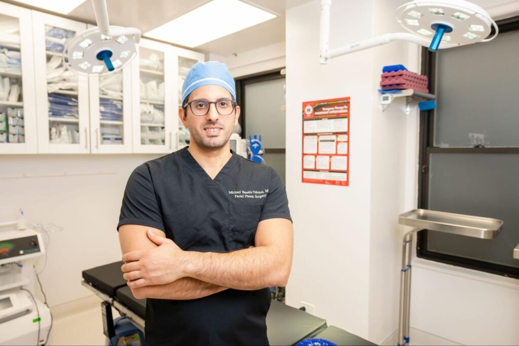 Dr. Michael Bassiri-Tehrani, a double board-certified facial plastic surgeon, in the operating room at his Manhattan surgery center where he performs preservation rhinoplasty